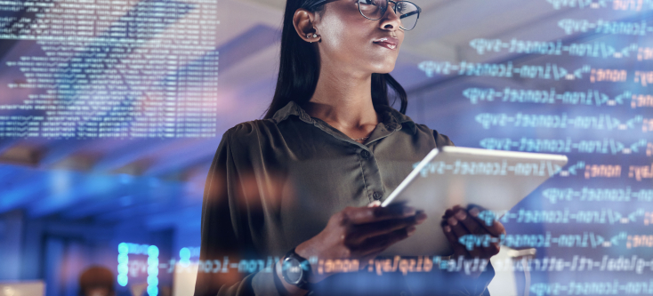 Researcher holding a tablet with data overlay